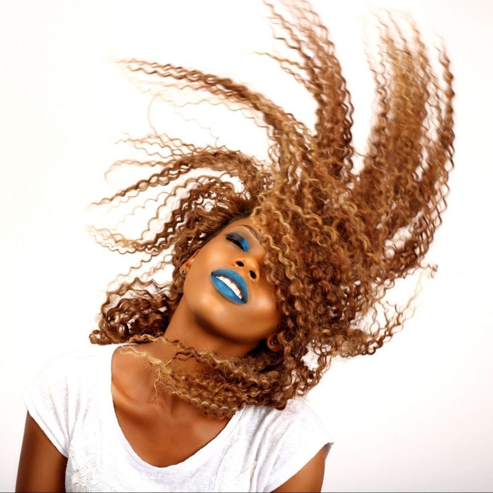 Image of woman with long hair for blog post on understanding hair type