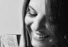 Image of woman smiling for nose to mouth lines treatments page